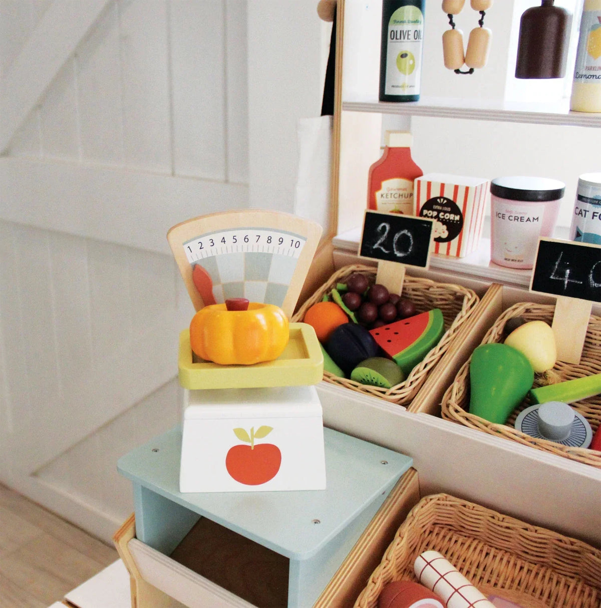 Tender Leaf Toys - Wooden Play Market Scale in a playroom market set up - Bella Luna Toys